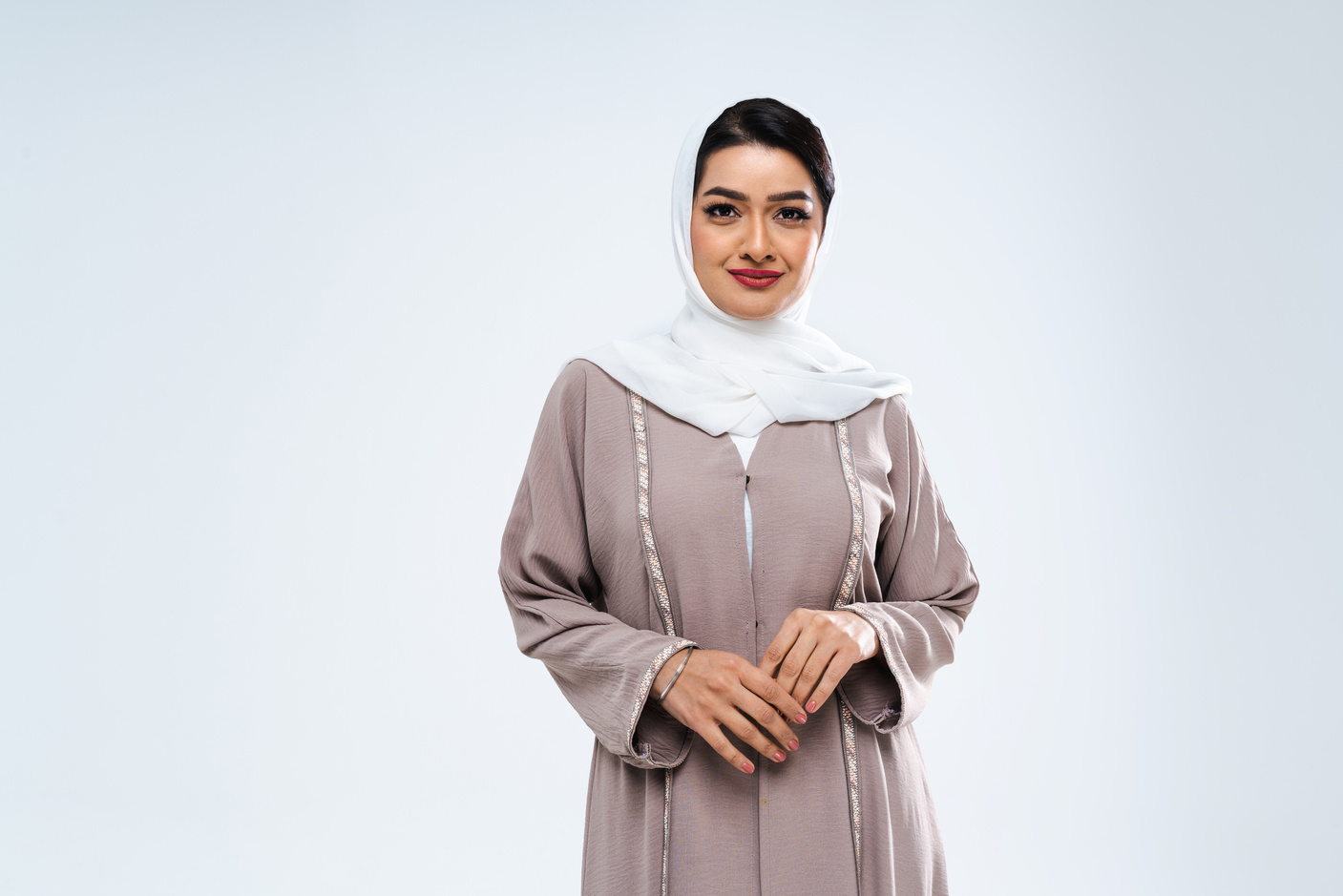 Beautiful arab middle-eastern woman with traditional abaya in st